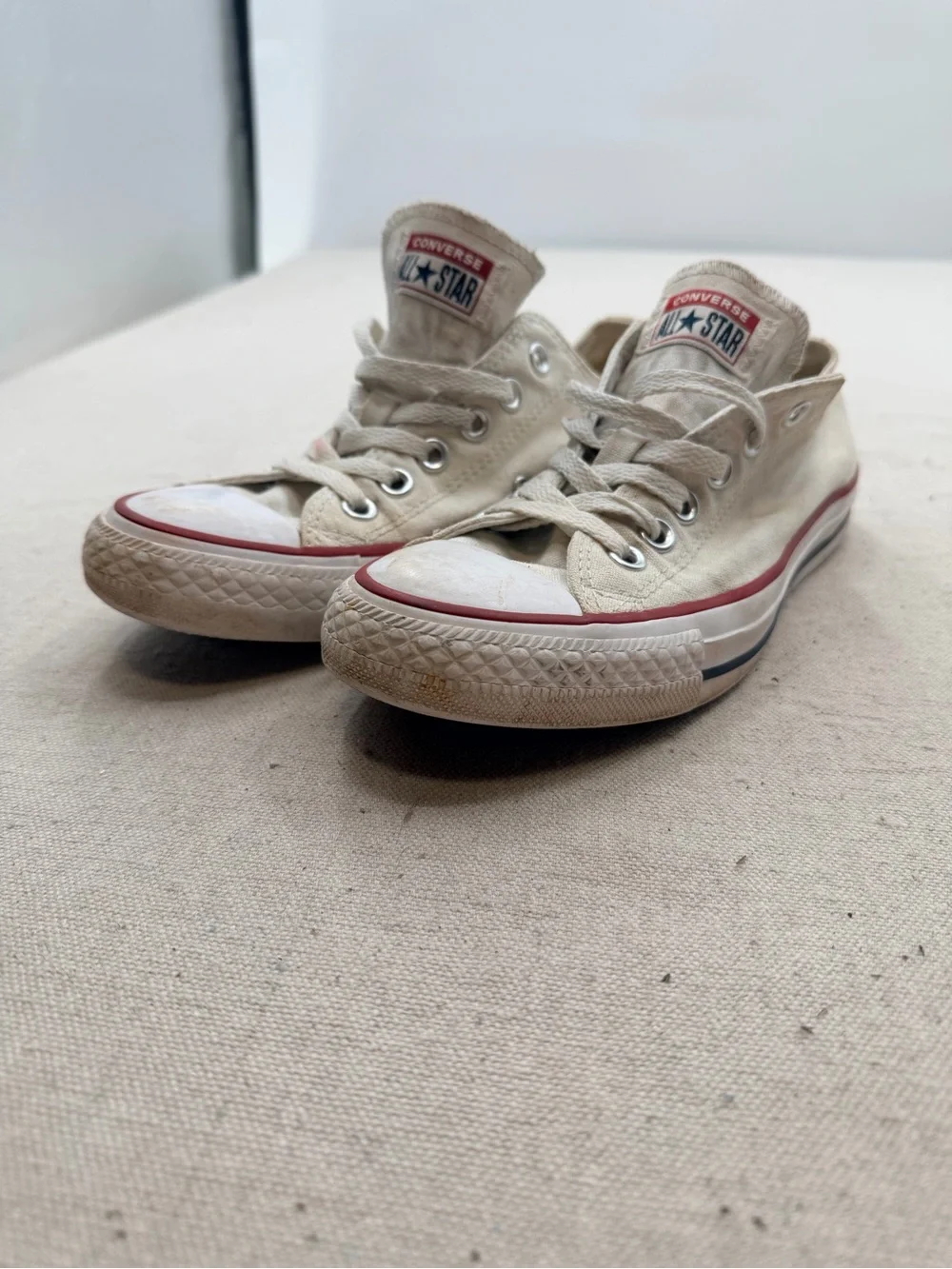 Converse White Low Top Sneakers with Red Trim